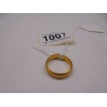 A 22ct gold wedding ring, size Q, 7.8 grams.