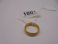 A 22ct gold wedding ring, size Q, 7.8 grams.