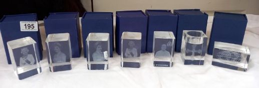 7 etched glass paperweights with boxes