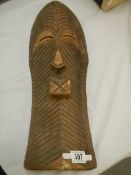 An African ceremonial mask, possibly Chad, 53 x 12 cm.