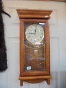 A Seiko quartz Westminster-Whittington wall clock. COLLECT ONLY