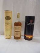 A bottle of The Dufftown Glenlivet, a bottle of The Glenlivet 12 a bottle of Highland Park Scotch