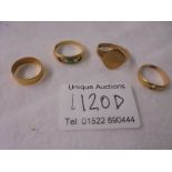 A 22ct gold ring 1.9g, an 18ct gold ring 4g, a 9ct gold ring 2.85g and an unmarked ring.