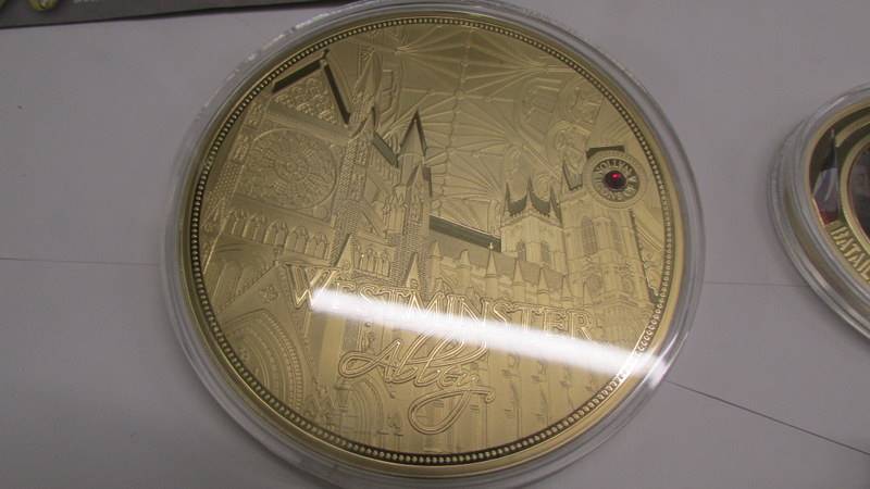 A large 'Icons of Britian' coin of Westminster abbey, an oval D Day coin and 2 The Great war coins. - Image 3 of 7