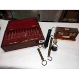 A vintage tray test kit in a wooden box, 4 bottles and a mahogany box balance scales etc