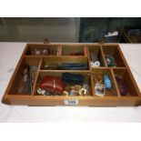 A small collectors case with contents