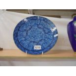 A Chinese blue glazed plate, 28 cm.