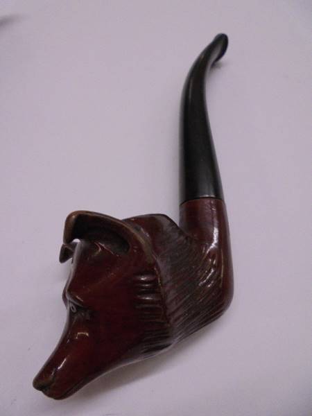 A carved bulls head pipe, a fox head pipe, an a/f African head pipe and one other. - Image 2 of 4