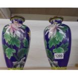 A pair of blue floral Cloissonne' vases.