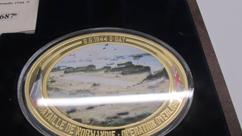 A cased '70th Anniversary of D-Day' coin set. - Image 5 of 6