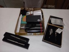 A miscellaneous lot including penknives, pens, wristwatch, musical cigarette box compact etc