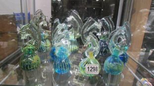 Ten Mdina glass seahorse paperweights, various sizes.