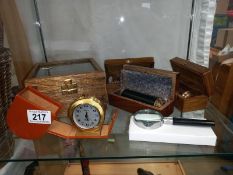 A cased brass sextant, 3 brass telescopes, a travelling clock and a magnifying glass