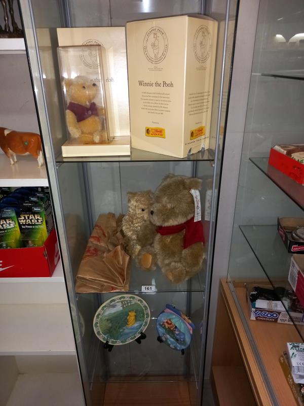 A limited edition boxed Steiff Winnie the Pooh and 2 Winnie the Pooh teddy bears with tags and 2