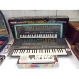 A boxed Yamaha PSS-480 music station organ and a Casio VL1, COLLECT ONLY.