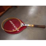 A vintage Wilson Future Star tennis racket with Dunlop cover