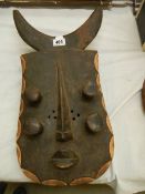 An African Grebo style wall mask, possibly Ivory Coast.