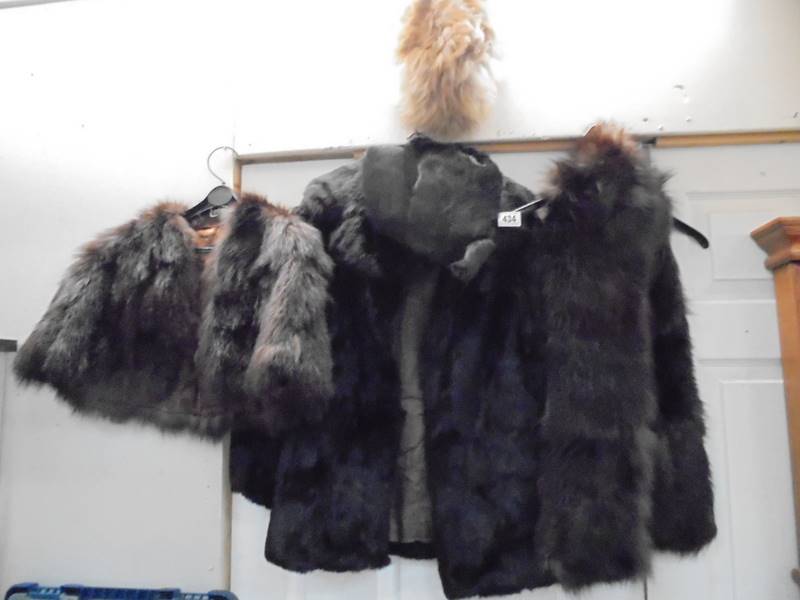 A Fur jacket and other fur items.