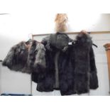 A Fur jacket and other fur items.