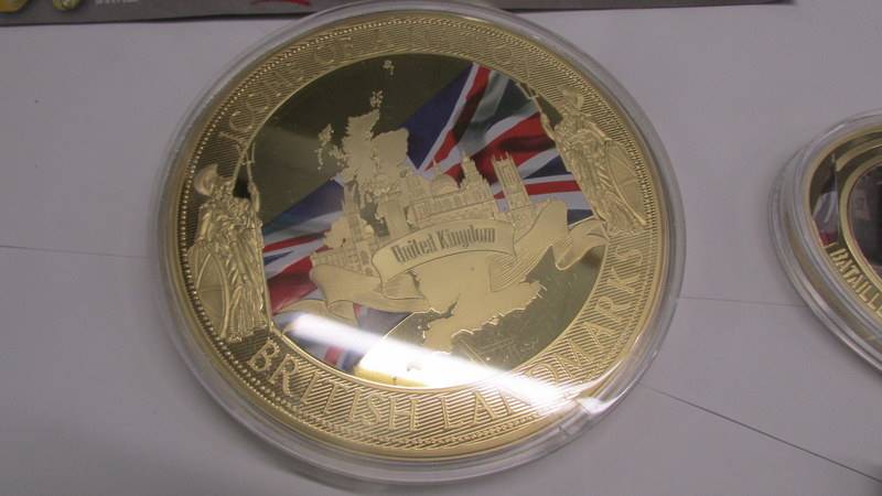 A large 'Icons of Britian' coin of Westminster abbey, an oval D Day coin and 2 The Great war coins. - Image 2 of 7