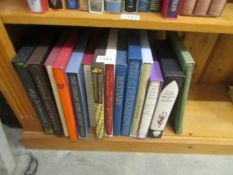 14 oversize Folio Society books including Melmouth the Wanderer, Bestiary etc.,