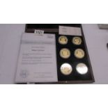 A case set of 'Royal Couples' coins with certificate.