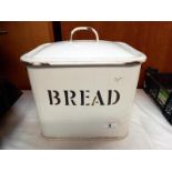 A vintage heavy enamel bread bin