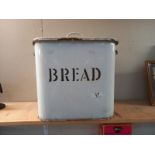 A vintage heavy enamel bread bin