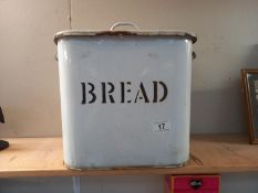 A vintage heavy enamel bread bin