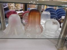 Seven assorted glass lamp shades, (all have chips).