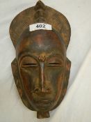 An East African style death mask, 30 x 25 cm.