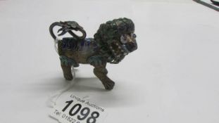 A small bronze and enamel dog of foo.