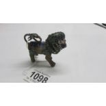 A small bronze and enamel dog of foo.