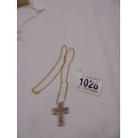 A large ornate 9ct gold diamond cross on 9ct gold chain, 3.6 grams