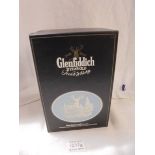 A boxed Wedgwood Glenfiddich 21 year old Scotch whisky decanter with contents.