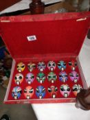 A case of vintage Chinese opera masks