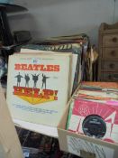 A mixed lot of 45 rpm, 78 rpm and LP records including Beatle's Yellow Submarine and HELP USA copy.