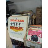 A mixed lot of 45 rpm, 78 rpm and LP records including Beatle's Yellow Submarine and HELP USA copy.