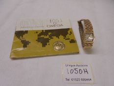 A 9ct gold ladies Omega Wristwatch, total weight 21.9 grams.