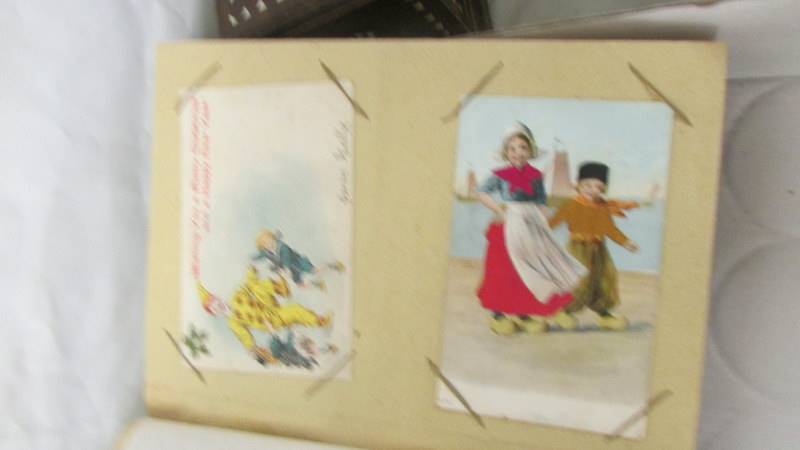 An album of postcards and a quantity of loose postcards. - Image 2 of 4