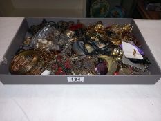 A large quantity of costume jewellery and watches
