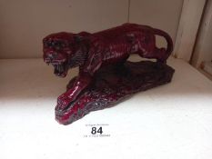 A flambe resin ornament of a tiger