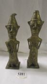 Two African bronze figures, possibly fertility/crop gods, 1 x 27cm (small hole in 1 eye), 1 x 25 cm,