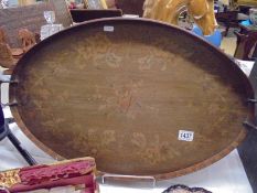 An Edwardian oval inlaid tray.