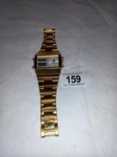 A large gold plated gents softech London digital analogue wrist watch