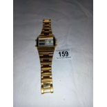 A large gold plated gents softech London digital analogue wrist watch