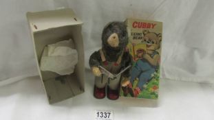 A mechanical Chubby the Reading bear' a/f, Made in China.