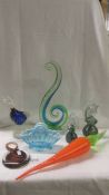 Two Mdina seahorse paperweights, a duck paperweight, a large glass ornament and other glassware.