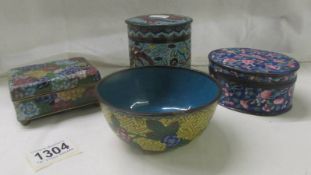 Three Cloissonne' lidded boxes and a Cloissonne' bowl,