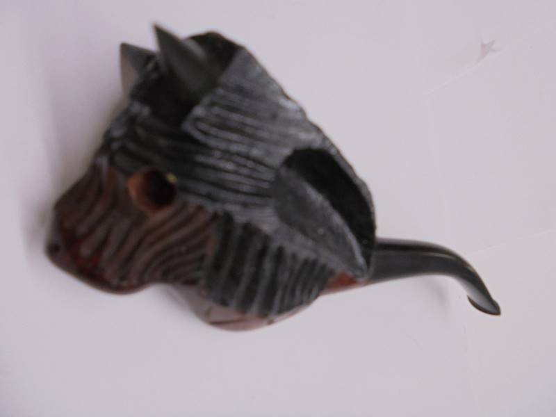 A carved bulls head pipe, a fox head pipe, an a/f African head pipe and one other. - Image 3 of 4